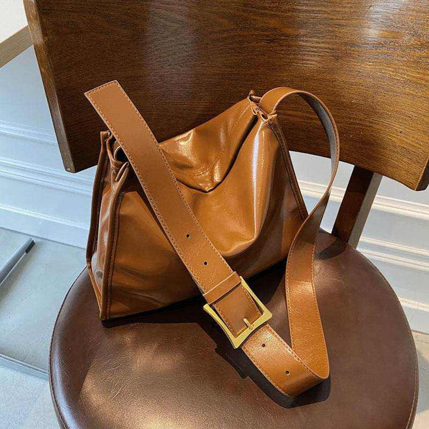 Retro Crossbody Commuter Tote in brown PU leather with adjustable strap, urban simplicity style.