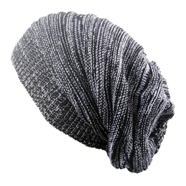 Two-color pleated pullover hat with unique textured design in black and white.