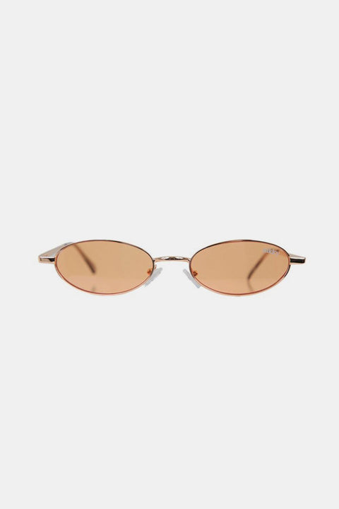 Nicole Lee Finley Oval Metal Frame Sunglasses with UV protection and sleek design.