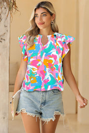 Multicolored abstract ruffle blouse with vibrant print and short flutter sleeves.