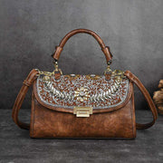 Retro diamond studded shoulder bag with sparkling embellishments, retro design, and adjustable strap.