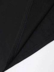 Close-up of black Easter Round Neck T-Shirt fabric showing stitching and texture.