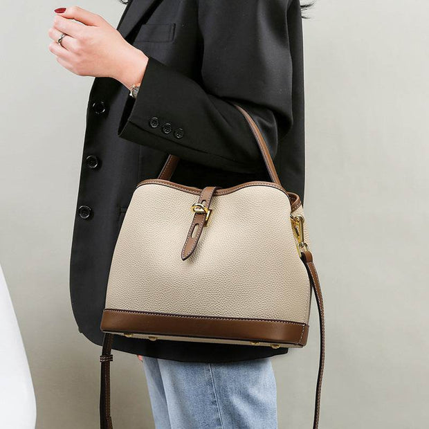 Milky white Ladies Messenger Bag with adjustable strap and elegant design, ideal for casual or professional use.