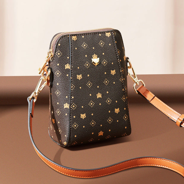 Stylish Crossbody Phone Bag by Foxer in brown with adjustable strap and multiple compartments.