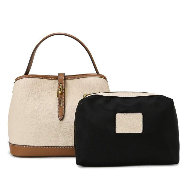 Milky white Ladies Messenger Bag with black pouch, PU material, bucket shape, stylish and spacious design.