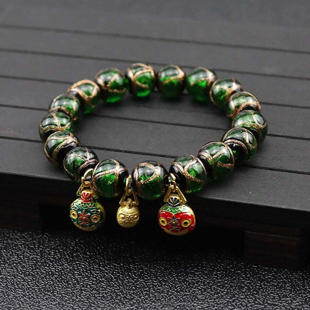 Gray colored glaze bracelet with glossy finish and geometric design.