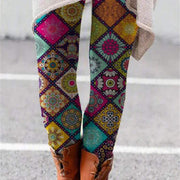 Colorful printed flared trousers with retro patterns, featuring a high-rise fit for stylish comfort.