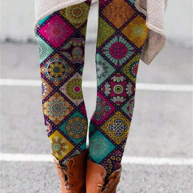 Colorful printed flared trousers with retro patterns, featuring a high-rise fit for stylish comfort.