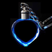 Crystal keychain with customizable photo feature, heart-shaped design, illuminated by LED light.