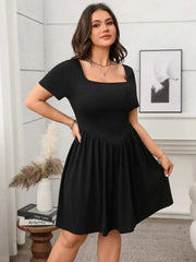 Plus size square-neck short-sleeve mini dress in black, featuring a flattering fit and comfortable fabric.