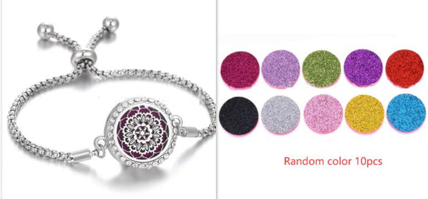 Hollow Stainless Steel Aromatherapy Bracelet with colorful essential oil pads.