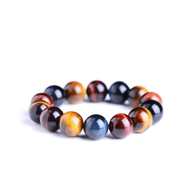 Tiger Eye Bracelet with polished natural stones in golden and brown hues for style and energy.