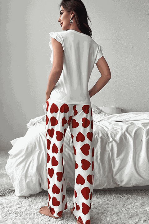 Pink Heart Ruffle Pajama Set with sleeveless top and relaxed fit pants.