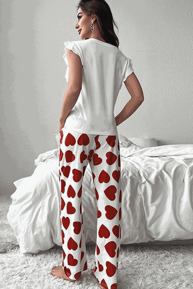 Pink Heart Ruffle Pajama Set with sleeveless top and relaxed fit pants.