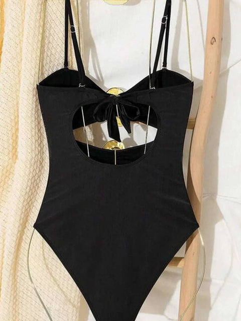 Sweetheart Cutout One-Piece Swimsuit with elegant neckline and bold cutouts.