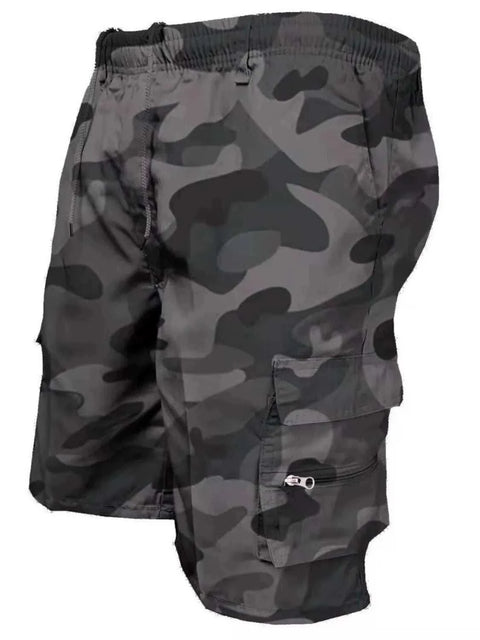 Plus size drawstring shorts with cargo pockets in camouflage pattern.