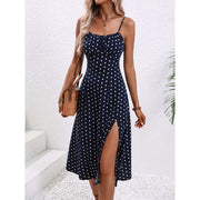 Polka Dot Suspender Dress with adjustable straps and flattering A-line design.