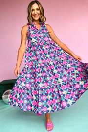 Vibrant 60s Flower Maxi Dress with tiered skirt and split neck design.