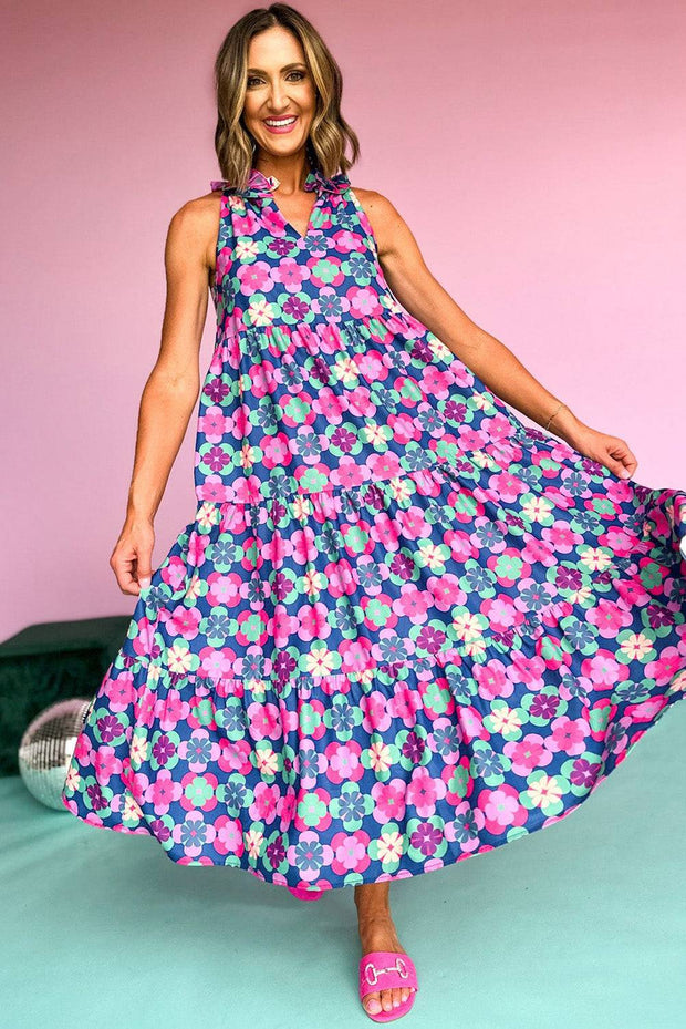 Vibrant 60s Flower Maxi Dress with tiered skirt and split neck design.