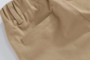 Close-up view of boys casual cotton trousers with pocket detail.