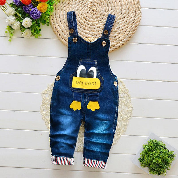 Children overalls with cartoon penguin design, adjustable straps, and multicolored cuffs, ideal for winter wear.
