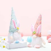 Easter Sequin Gnome Hat with vibrant sparkles and bunny ears in pastel colors.