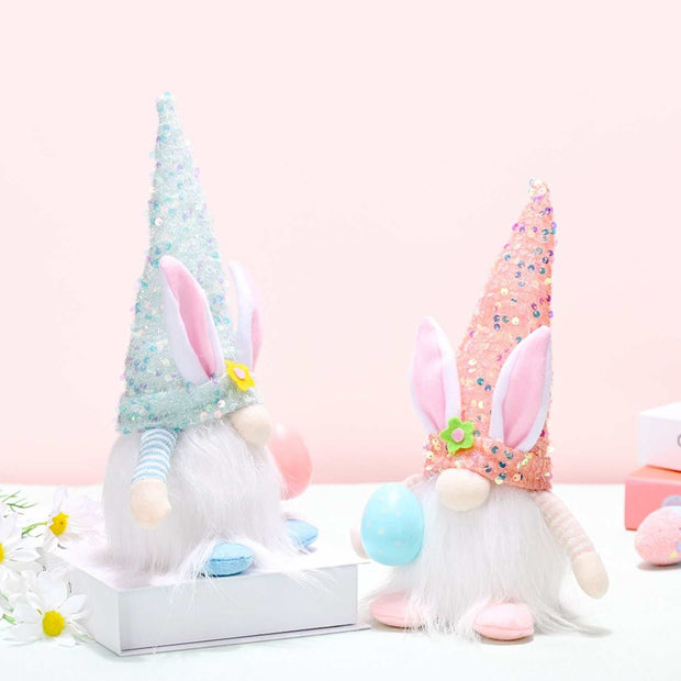 Easter Sequin Gnome Hat with vibrant sparkles and bunny ears in pastel colors.