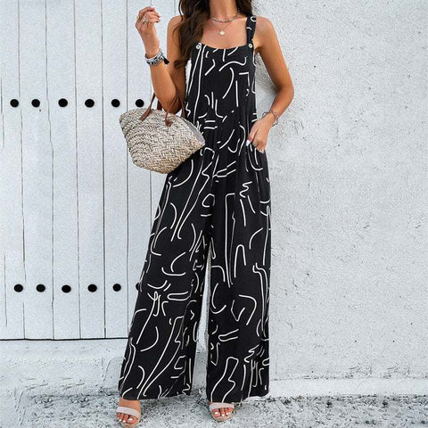 Trendy square neck jumpsuit with abstract pattern, styled with a woven handbag and sandals for a chic look.