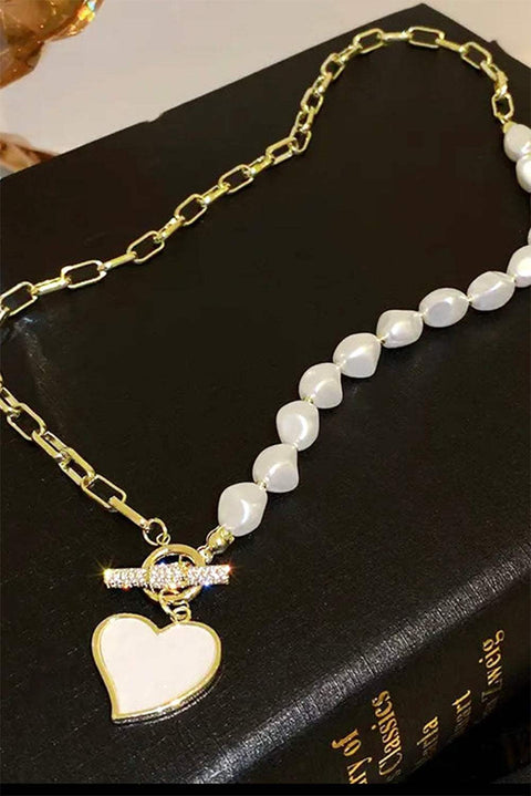 Gold Heart Rhinestone Pearl Necklace with heart pendant and adjustable chain.