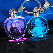 Crystal Keychain with Custom Photo, heart and hexagonal shapes, featuring laser-etched images, illuminated by colorful light.