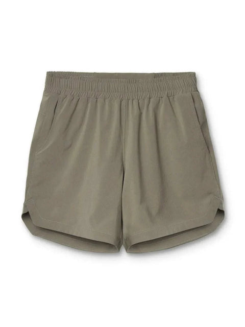 Elastic Waist Active Shorts in beige with pockets, perfect for workouts.