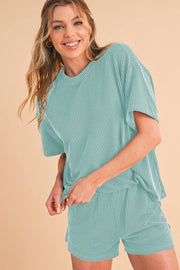 Orange ribbed tee and shorts set for casual wear.