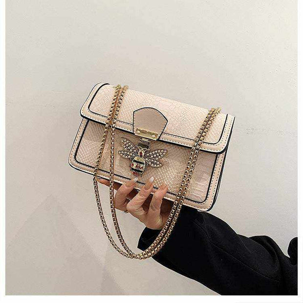 Chain shoulder bag with elegant design and chic chain strap.