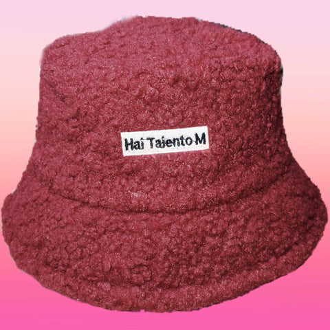 Lambswool Female Fishing Cap in red with a short brim.