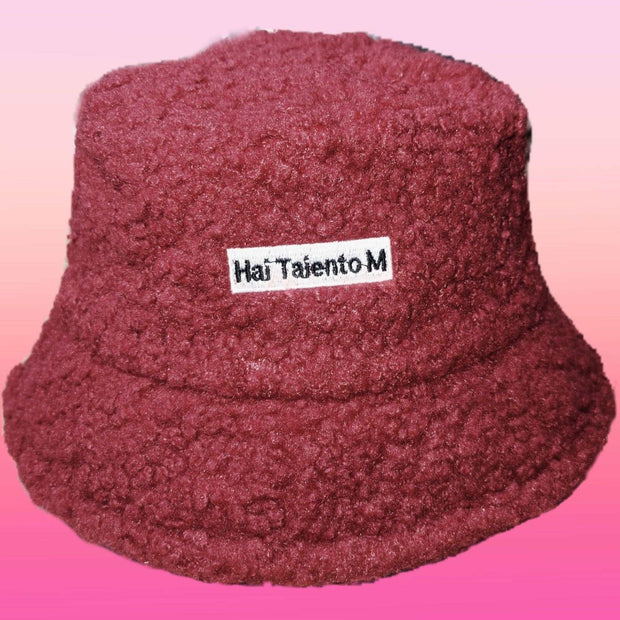 Lambswool Female Fishing Cap in red with a short brim.