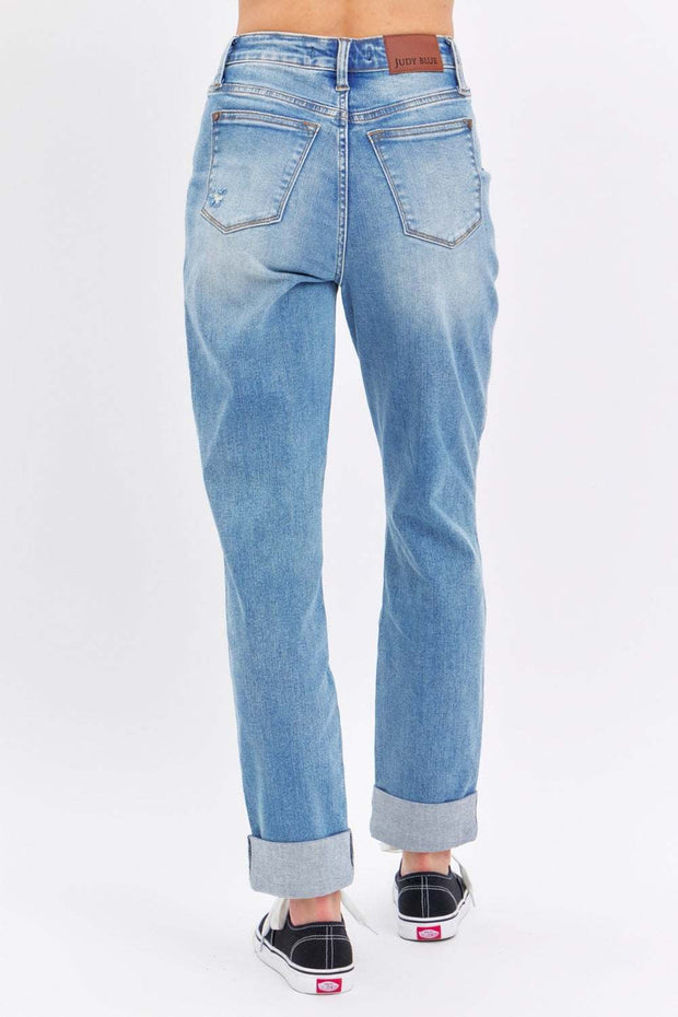 Judy Blue Distressed Straight Jeans showcasing back view with trendy distressing and rolled cuffs.