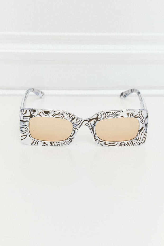 Tortoiseshell Rectangle Polycarbonate Sunglasses with UV400 protection on white background.