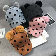 Ball Peaked Hat with double ball design in various colors.