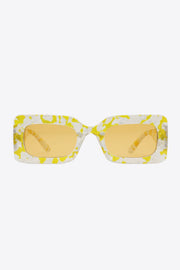 Tortoiseshell rectangle polycarbonate sunglasses with yellow lenses.