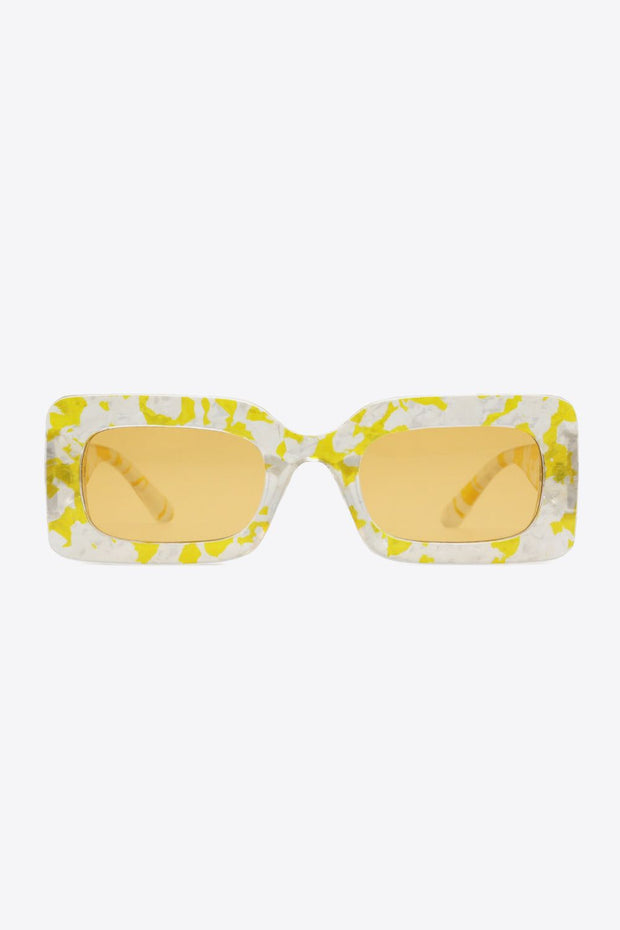Tortoiseshell rectangle polycarbonate sunglasses with yellow lenses.