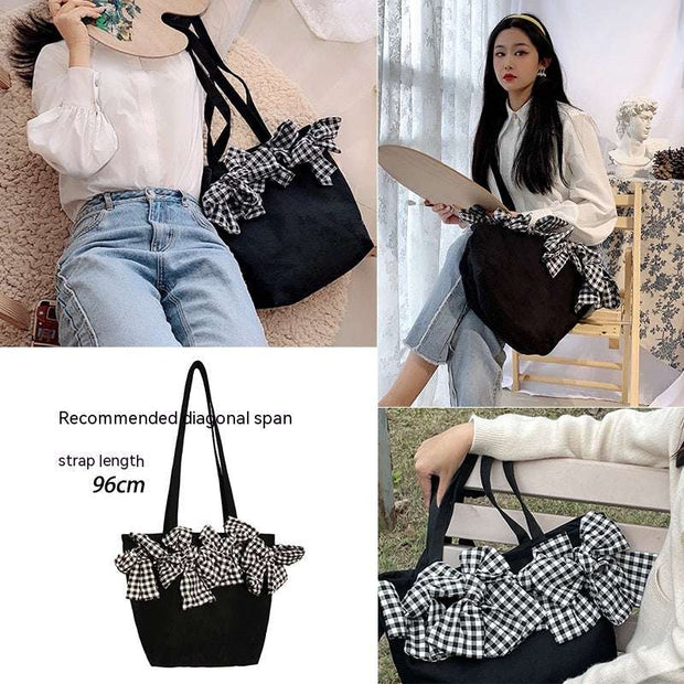 Big Bow Crossbody Bag with oversized bow and adjustable strap, suitable for casual and chic occasions.