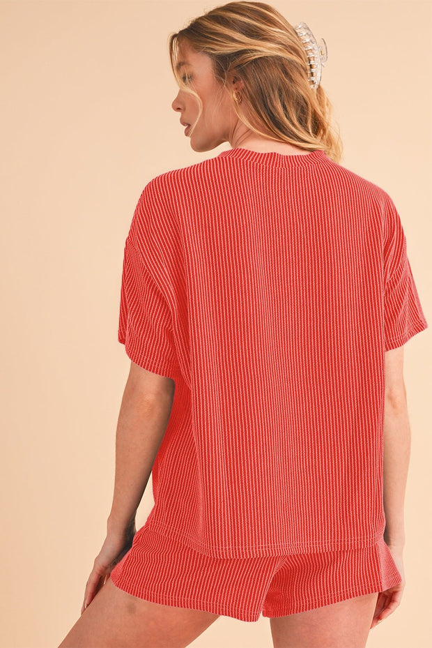 Orange ribbed tee and shorts set for casual wear.