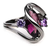 Crystal Ring with dazzling purple centerpiece and elegant design.