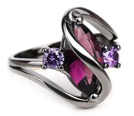 Crystal Ring with dazzling purple centerpiece and elegant design.