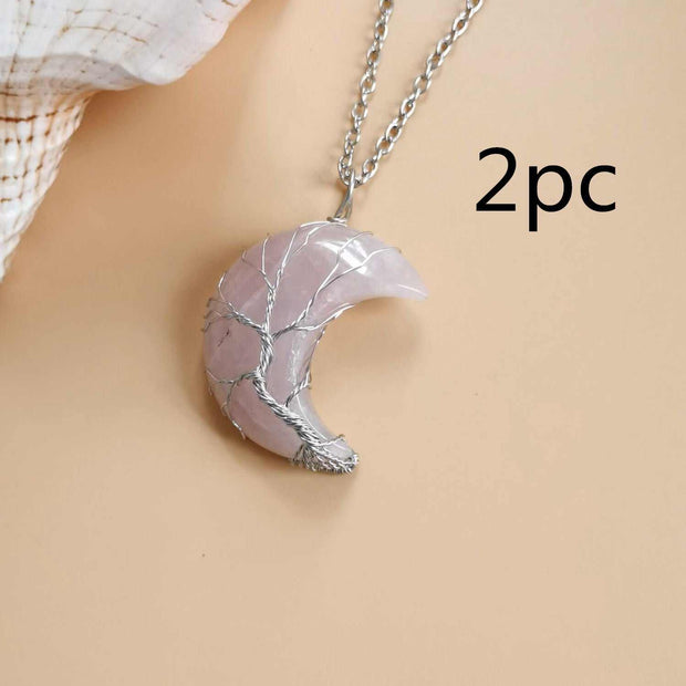 Moon Tree Of Life Necklace with crystal crescent moon, elegant jewelry showcasing growth and connection.