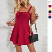 Sleeveless solid color A-line dress in red.
