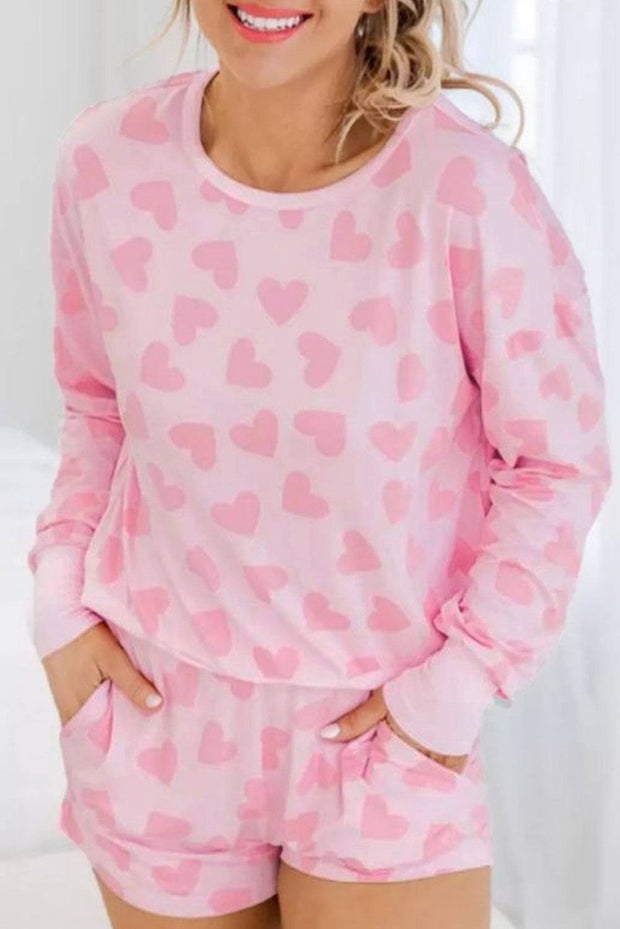 Pink heart print loungewear set with matching top and shorts for comfort and style.