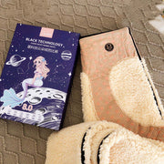 Lambs Wool Leggings packaging showcasing soft, warm fabric and space-themed design.