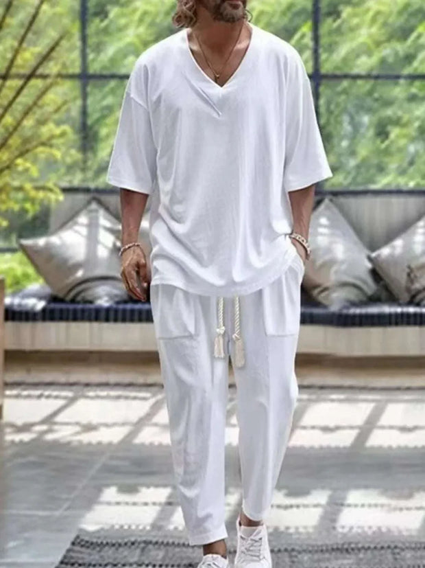 Men's V-Neck Half Sleeve Top and Pants Set in white, featuring a relaxed fit, ideal for casual and semi-formal occasions.