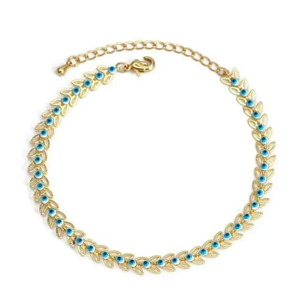 Gold charm bracelet with blue accents and secure clasp.